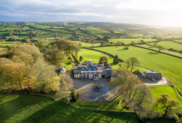 aerial view of the manor house and surrounding estate and parkland