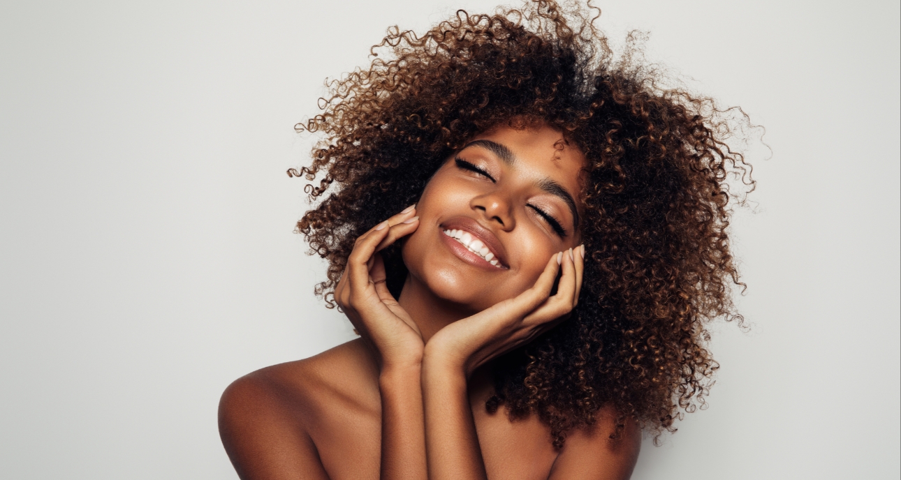 Woman with beautiful skin looking happy 