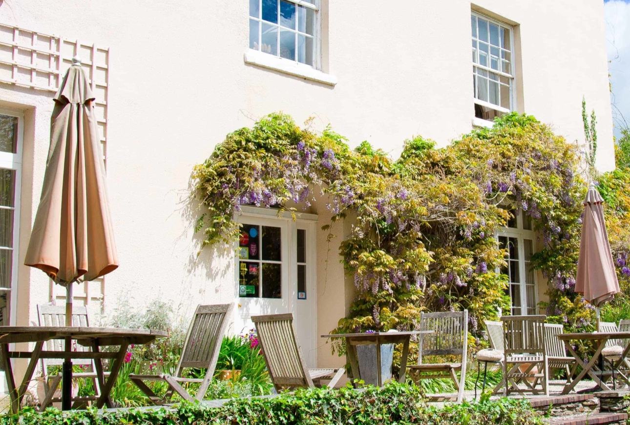 Cafe tables on the terrace in front of Plantation House