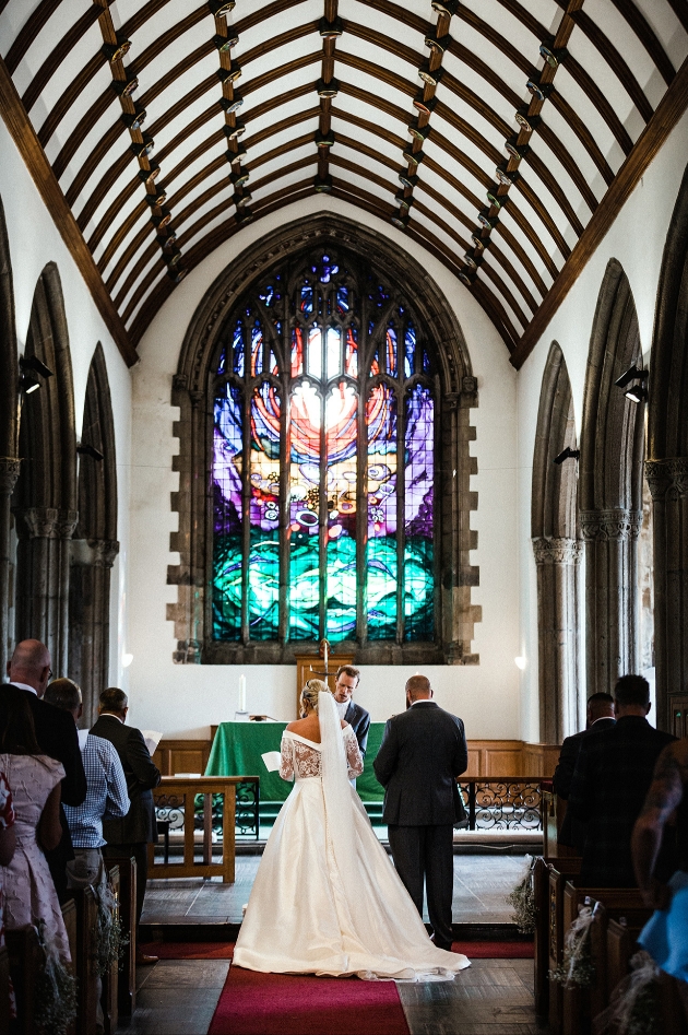 Photo of couple at altar