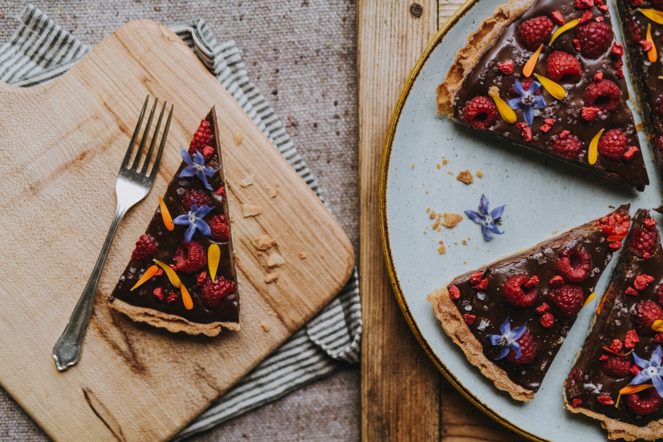 Chocolate, raspberry and edible flower tart from Pickle Shack