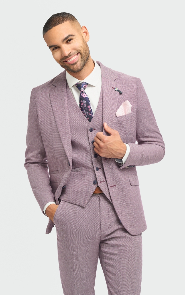 man in pinkish coloured suits