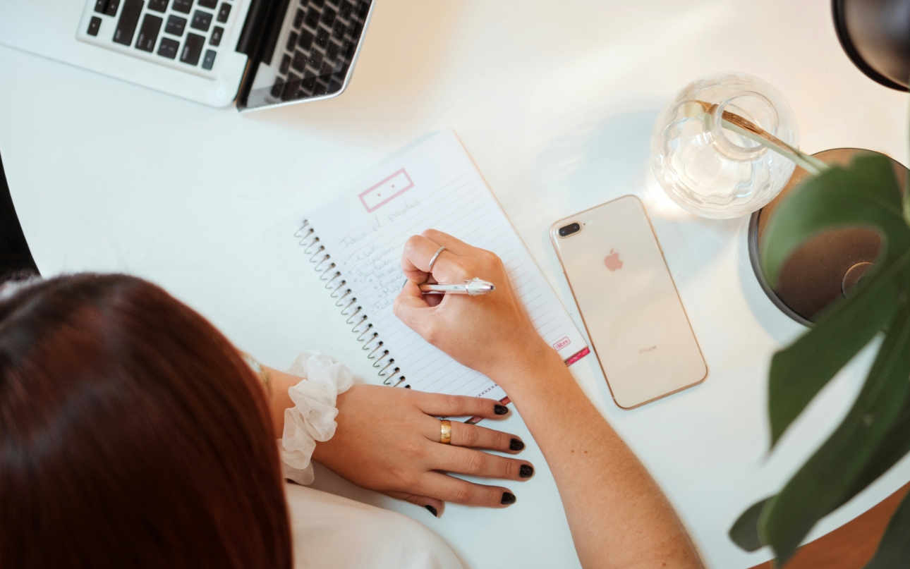 woman at table planning