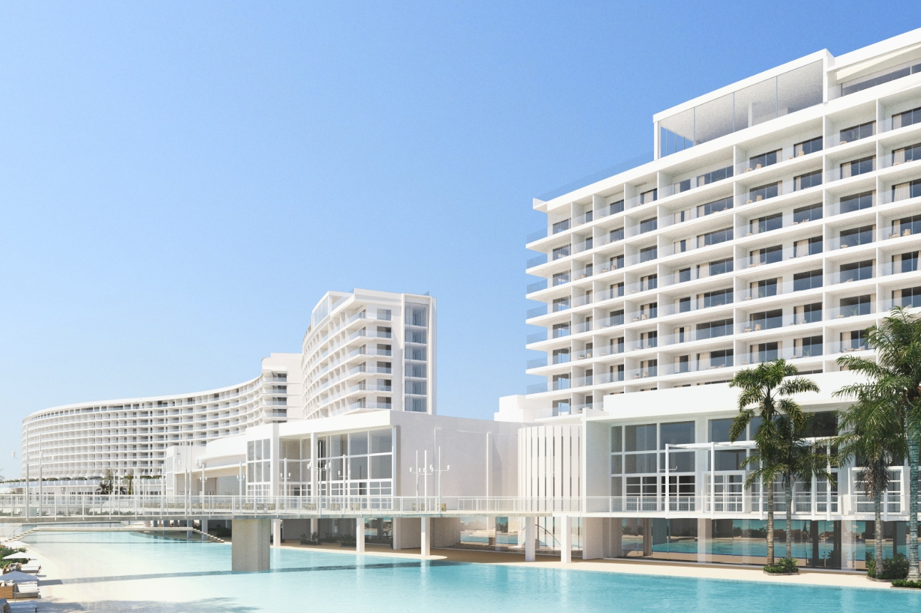 Outside shot of AVA resort showing the brilliant blue pool and white building