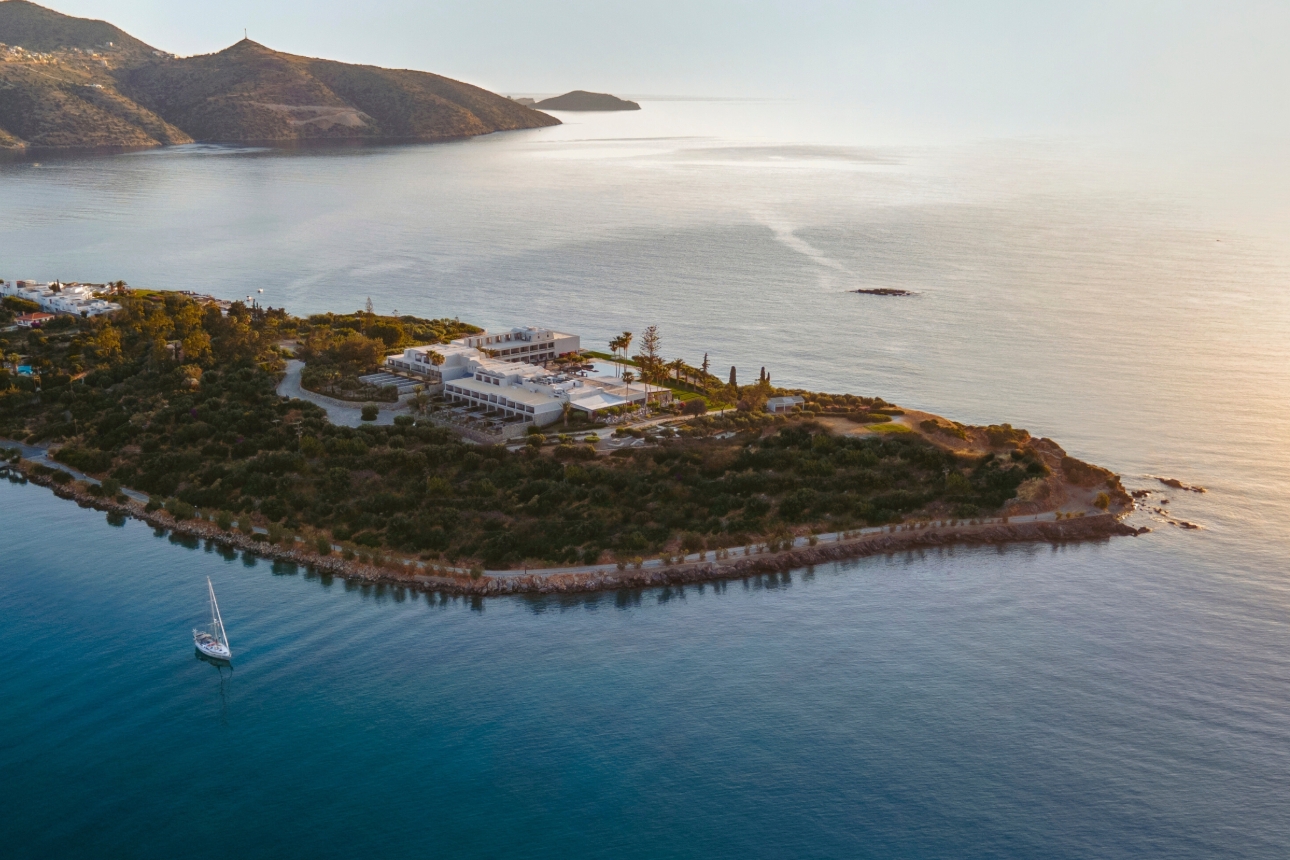 drone shot of large resort on island 
