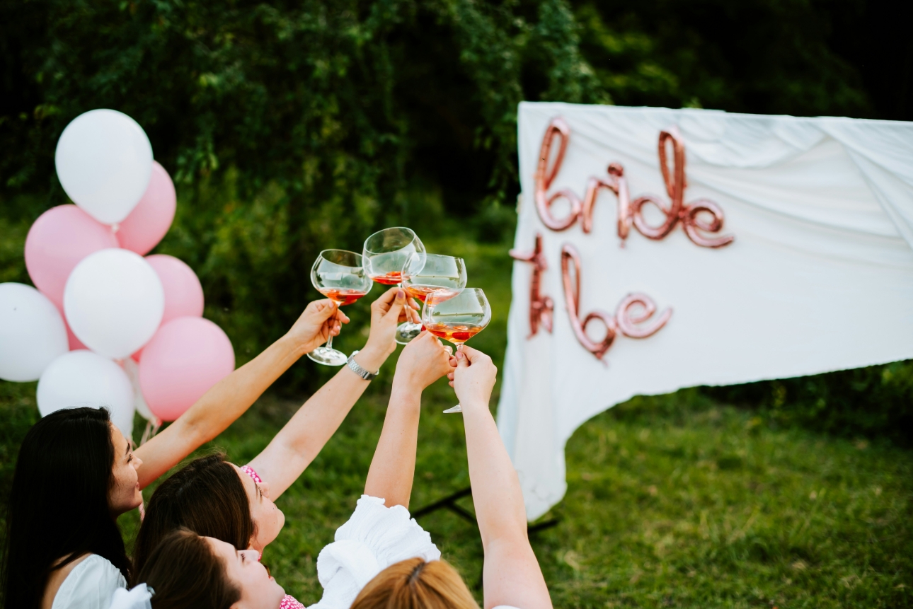 Hen Party in garden with champagne and balloons