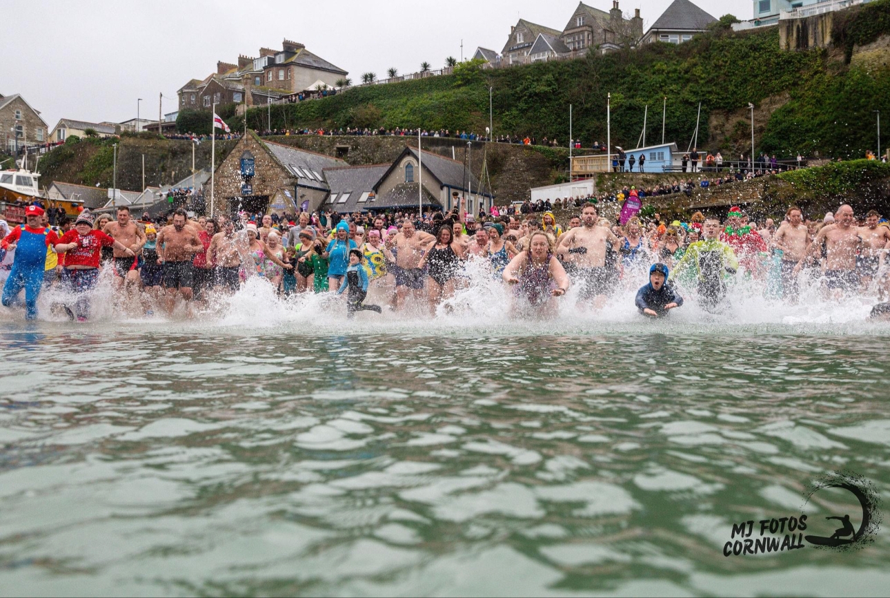People taking a dip in Newquay on New Year's Day