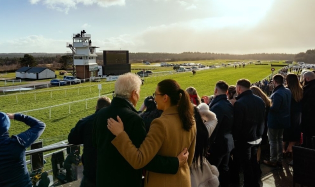 A couple at Exeter Racecourse in Devon